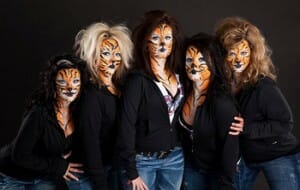 The CR Spirits made up as tigers for a video shoot